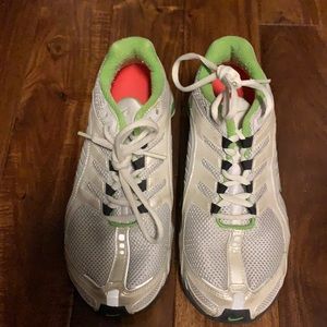 Green and white Nike Shox